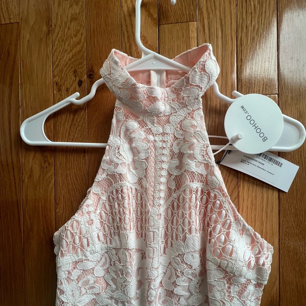 Boohoo lace jumpsuit new with tags. Size 4.